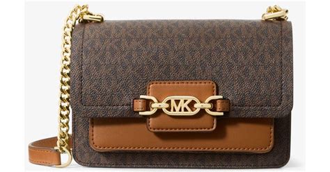 michael kors heather small|Michael Kors Heather Xtra Small Crossbody Luggage .